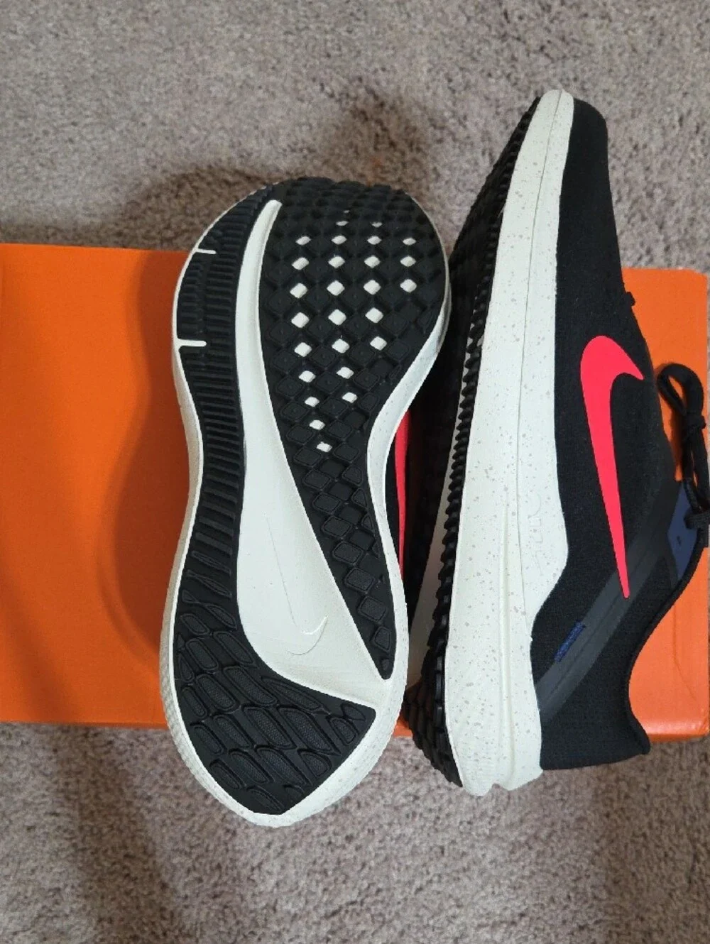 Nike Men’s Black Sneakers with Coral Red Swoosh